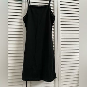 Black dress is a size 16 in good condition.